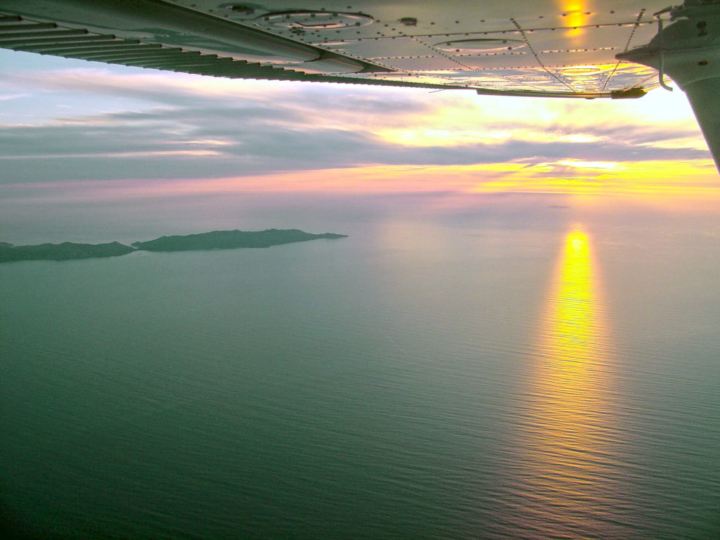 Aerial tour flight returning from Catalina Island, California, USA