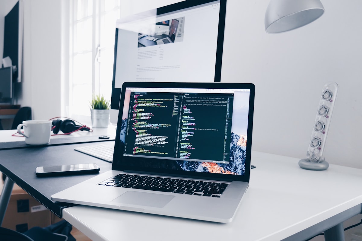 Laptop and tech gear arranged for portable remote work