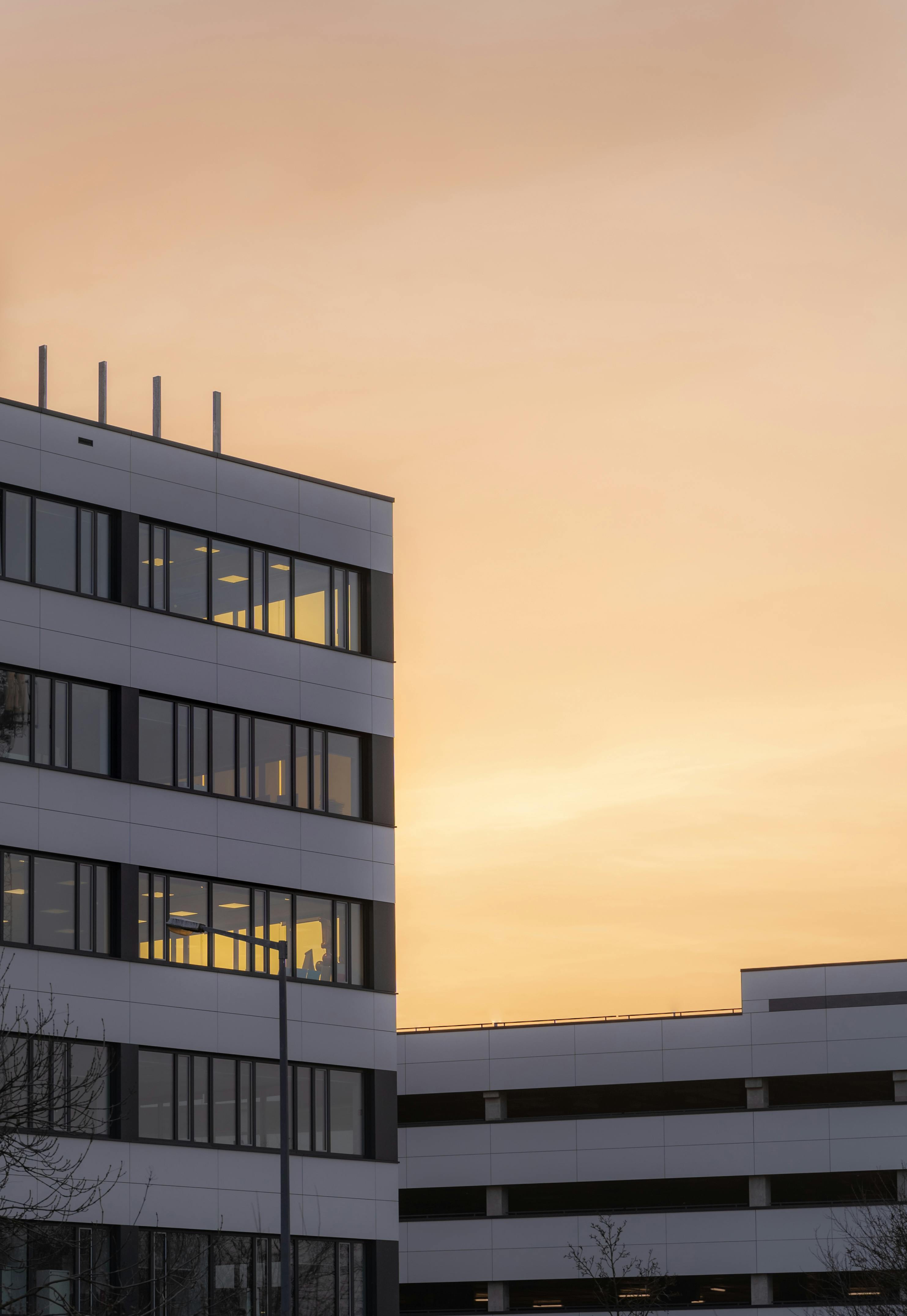 Modern office buildings at sunset in a Polish city